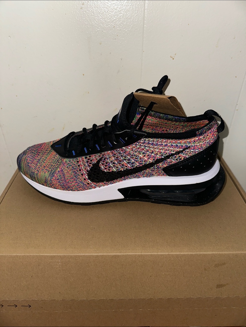 Nike Multicolor Flyknit Sneaker with Black Swoosh